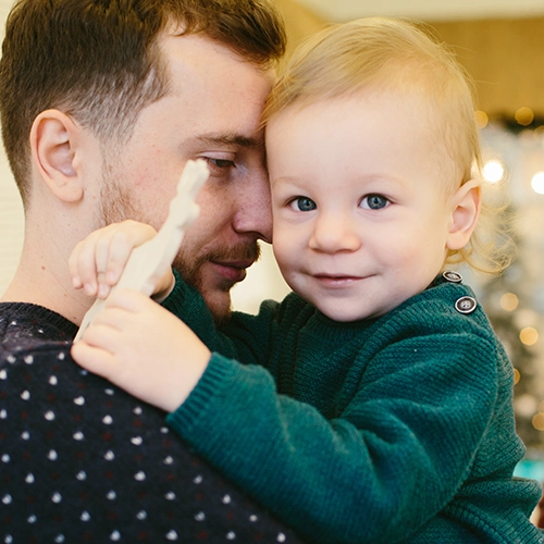 A student sketching at a desk