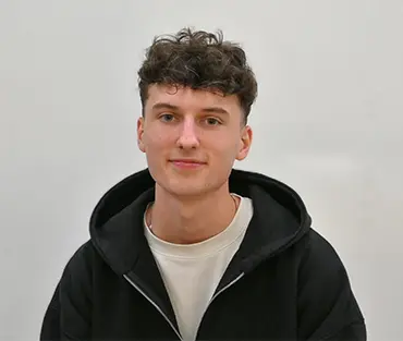 Head shot of male student smiling