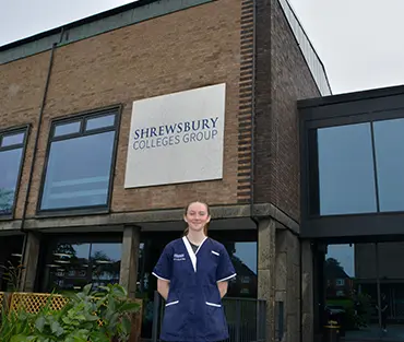 Mia Jackman standing outside London Road Campus